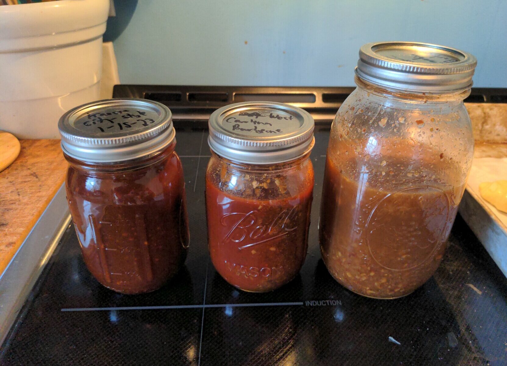 Three barbecue sauces - from left to right: Kansas City-style sauce, West Carolina-style sauce, East Carolina-style sauce